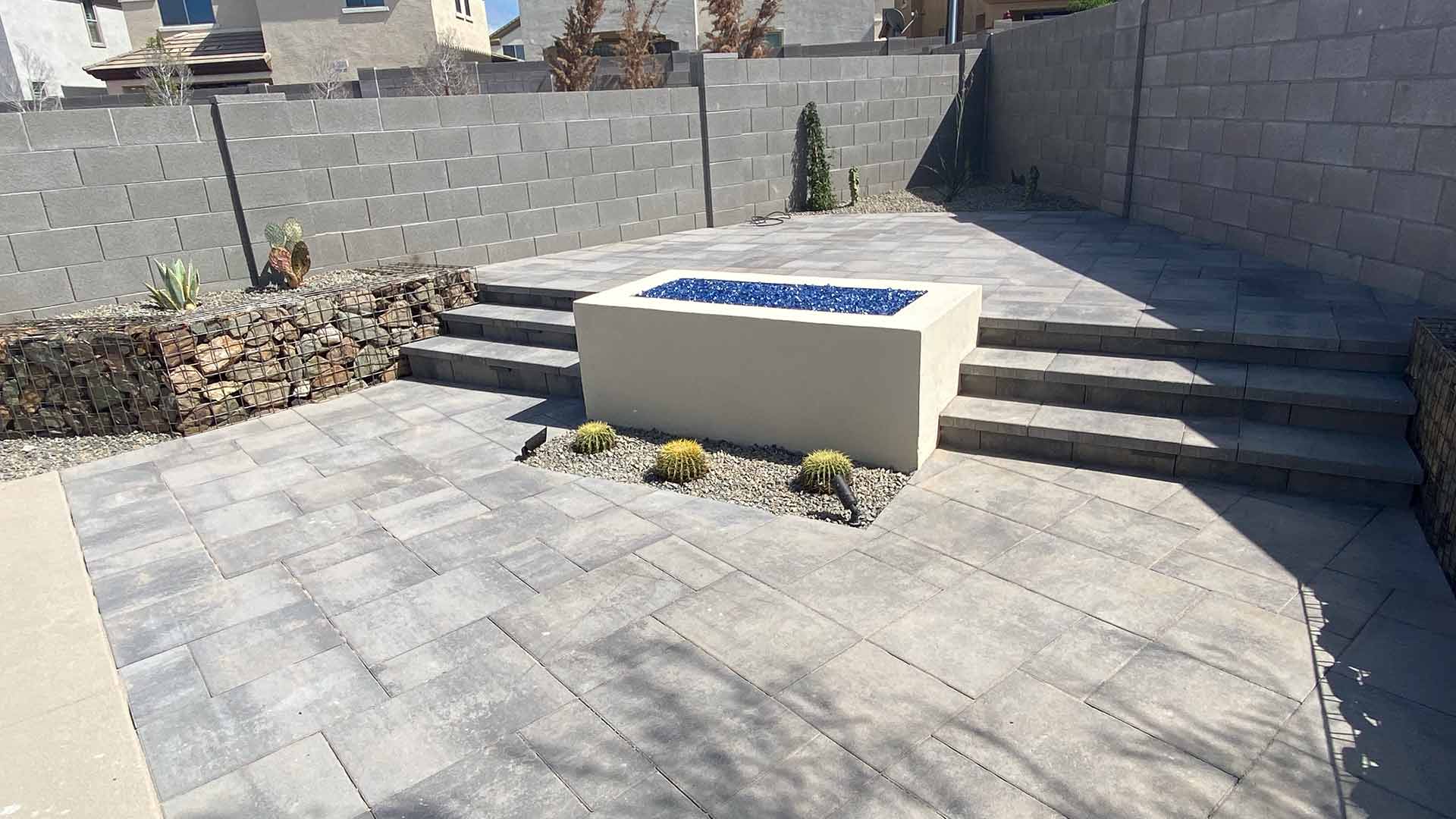 Custom patio and outdoor steps with fire pit in Scottsdale, AZ.