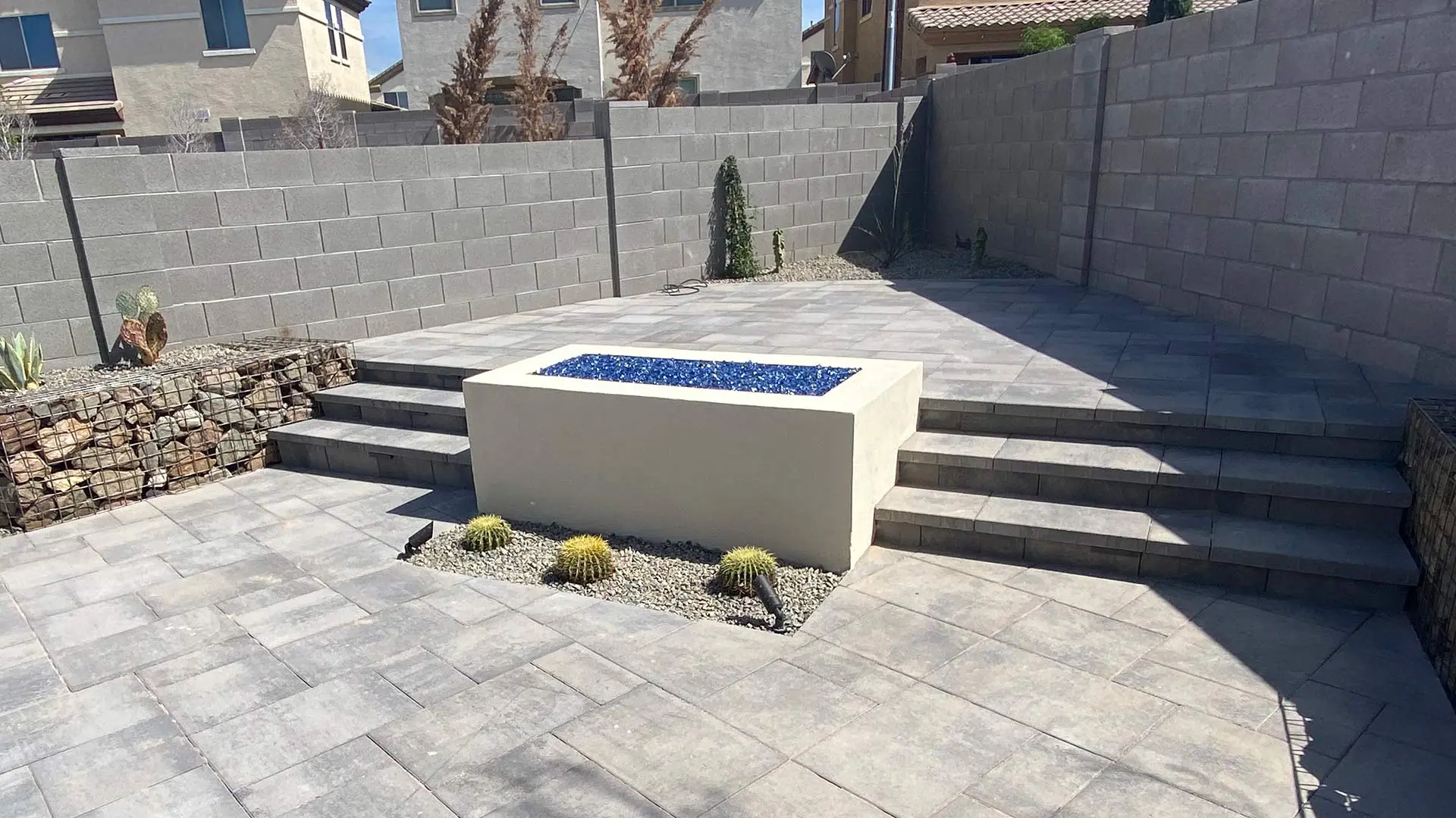 A rectangular gas fire pit installed for back patio in Glendale, AZ.