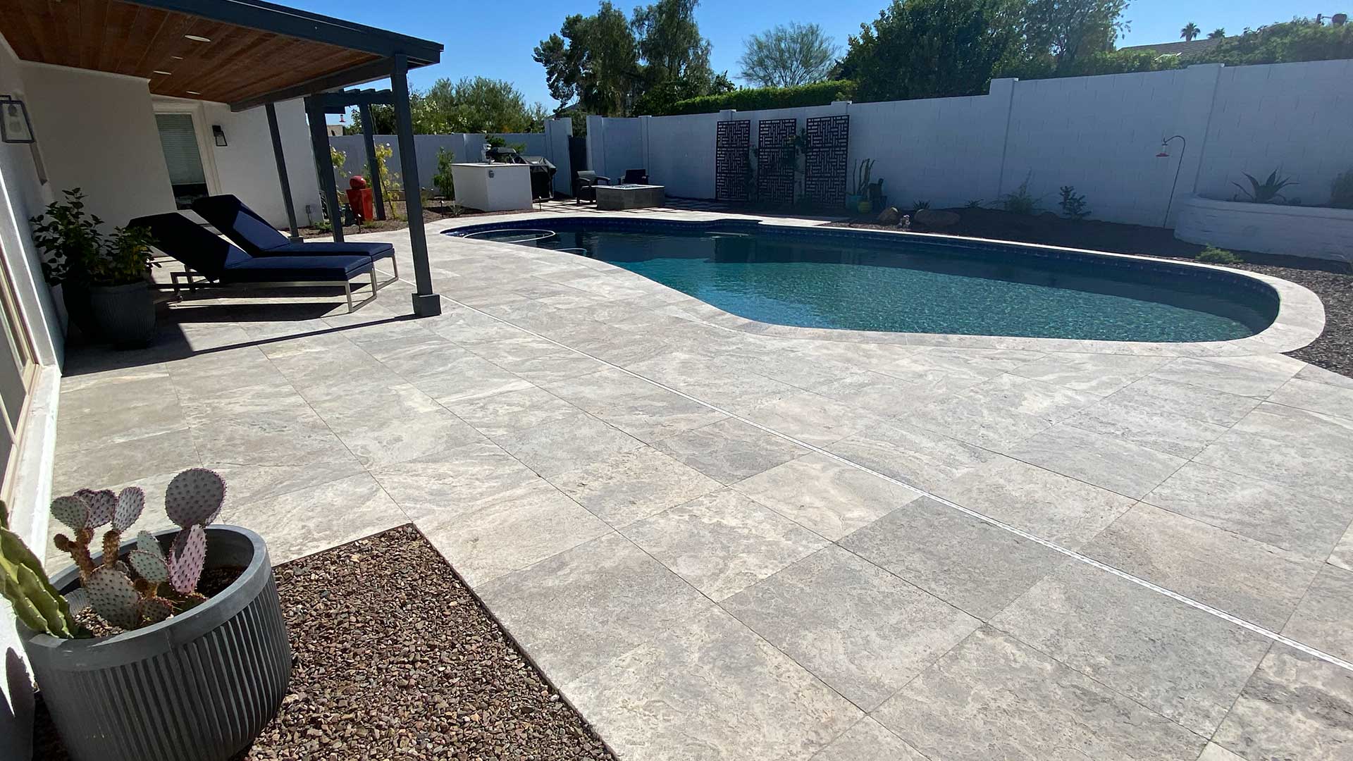 Custom paver patio and swimming pool at a home in Phoenix, AZ.