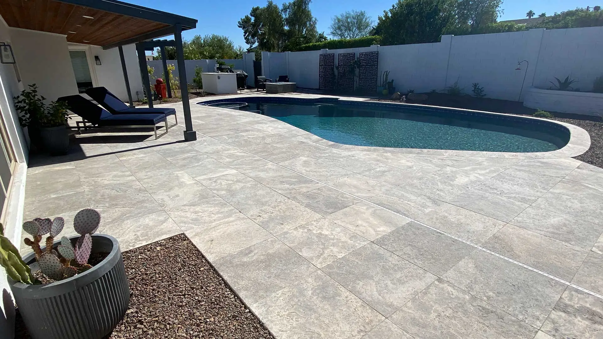 Custom paver patio and swimming pool at a home in Phoenix, AZ.