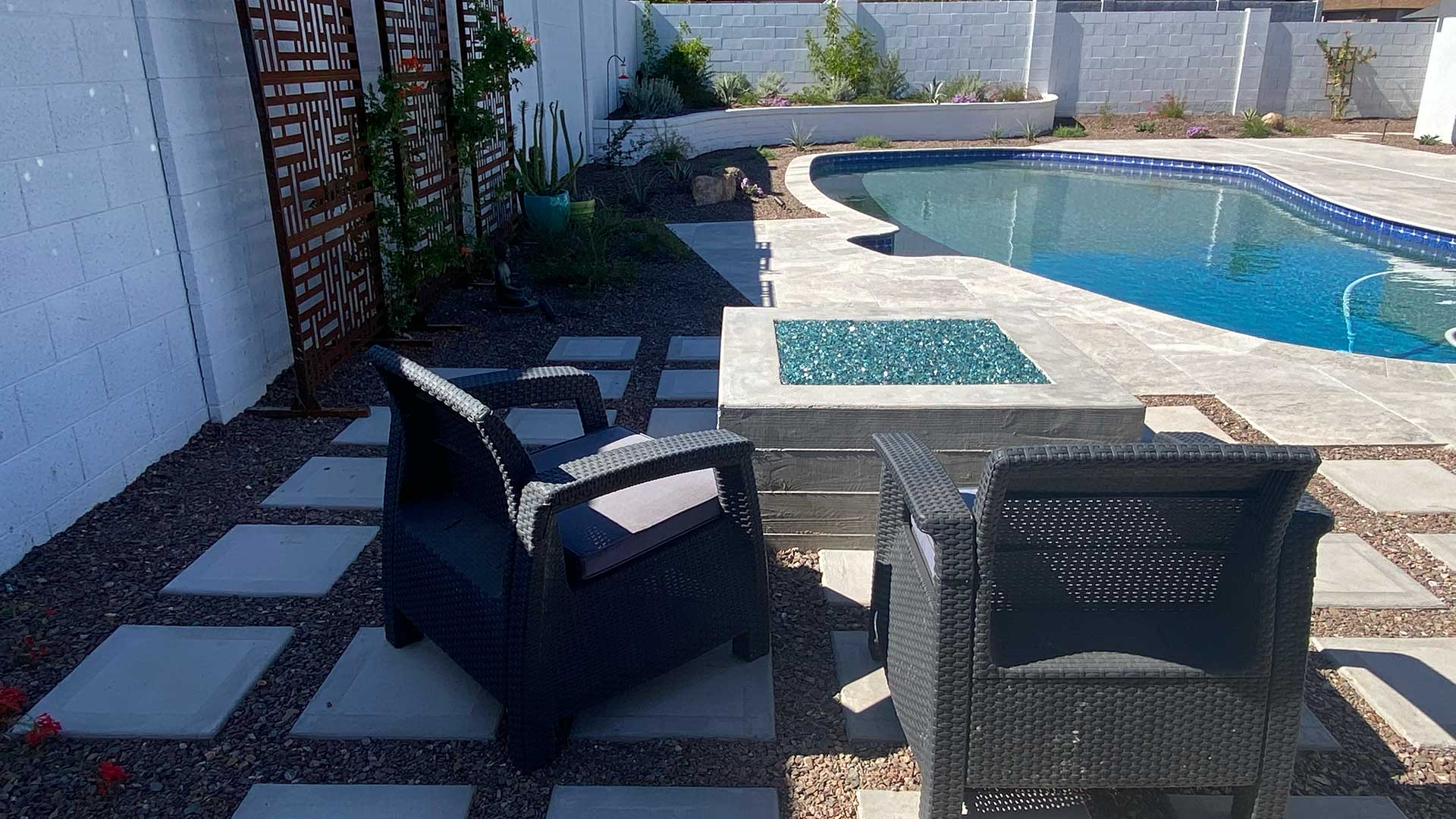 Swimming pool with custom patio and landscape design near Phoenix, AZ.