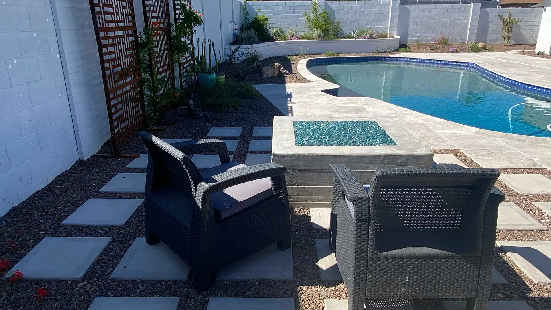 Swimming pool with custom patio and landscape design near Phoenix, AZ.