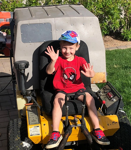 Owner's son on a machinery in backyard in Scottsdale, AZ.