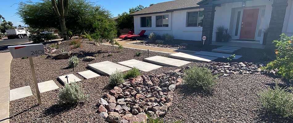 Weed-free rock mulch and plantings installed at a home in Scottdale, AZ.