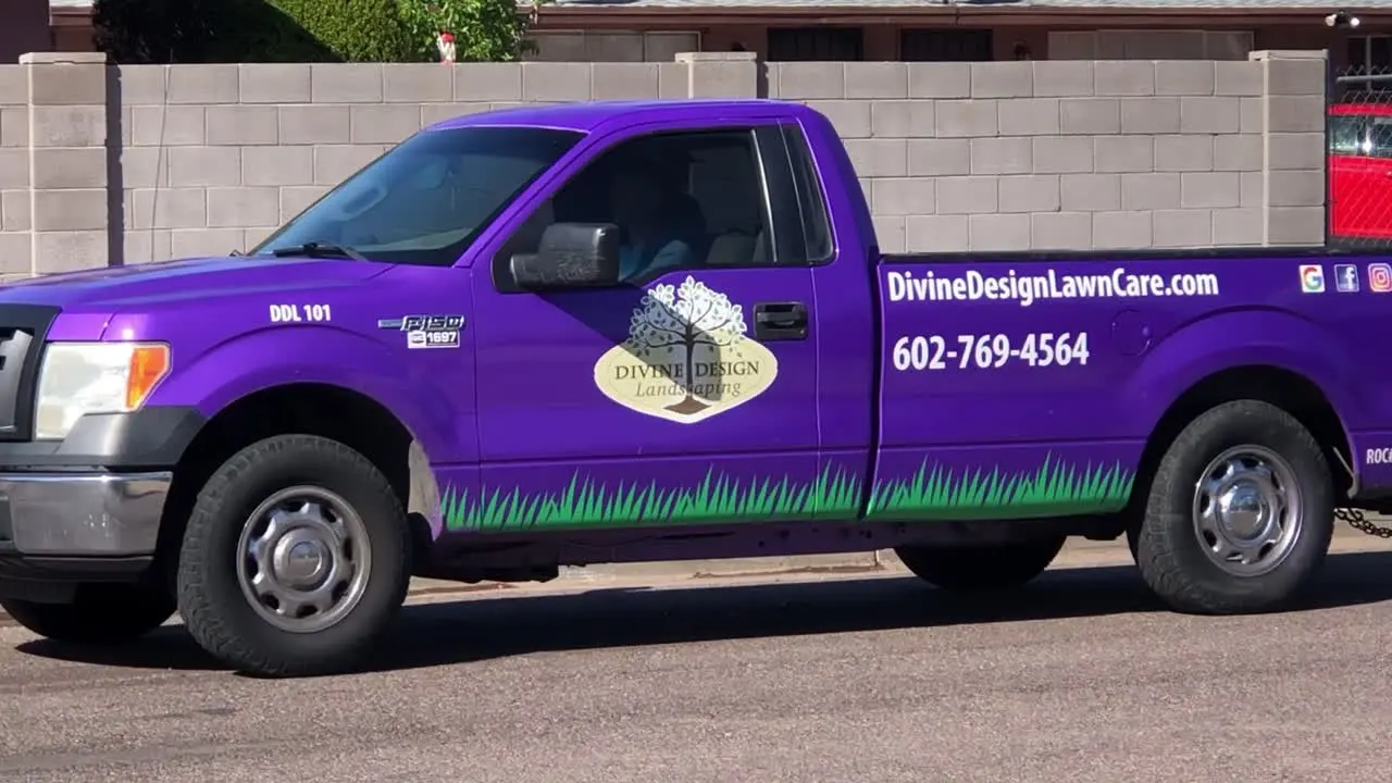 Divine Design Landscaping service truck.